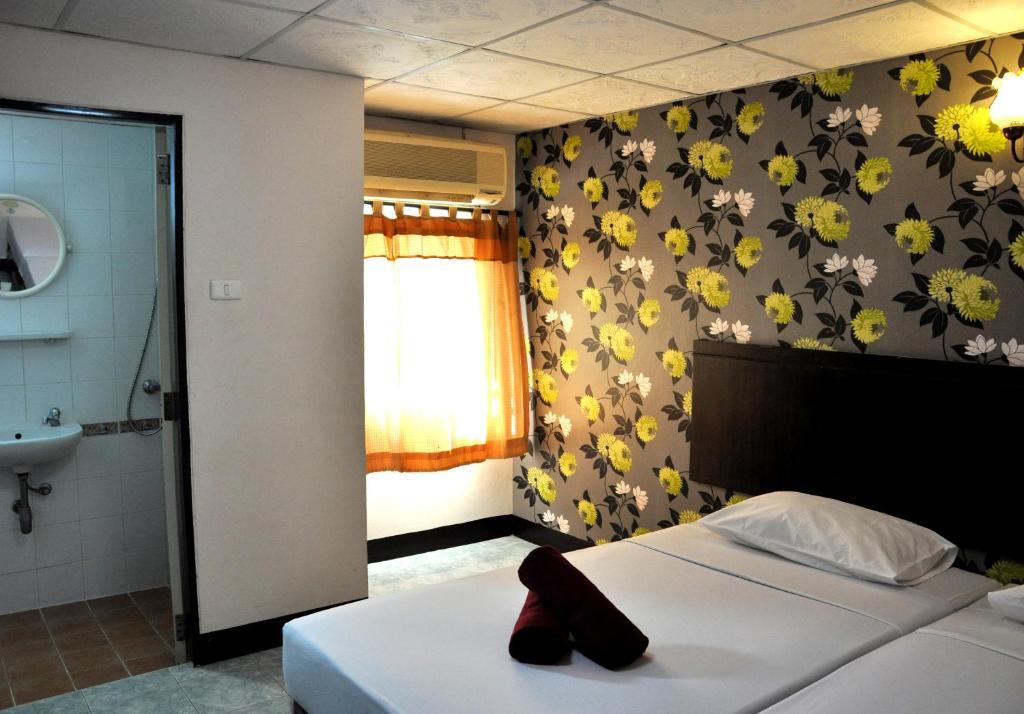 Four Sons Inn Bangkok Phòng bức ảnh